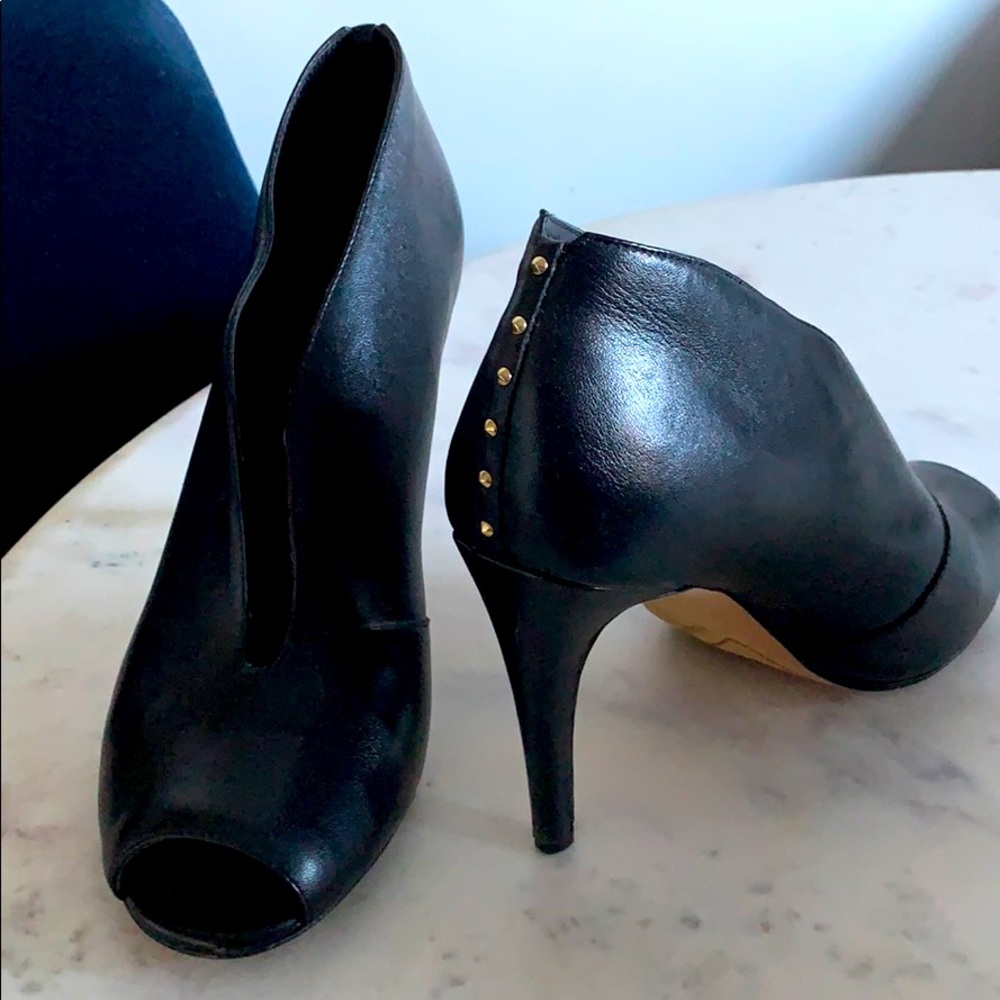 Peep toe black leather heels